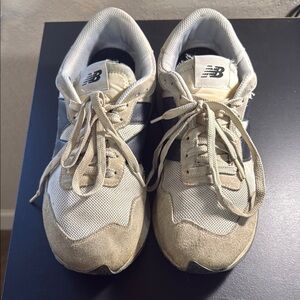 New Balance Beige and Black Sneakers